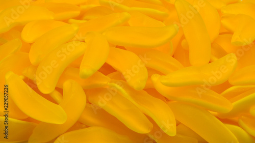 Yellow banana gummy candies. Top view. Jelly  sweets.