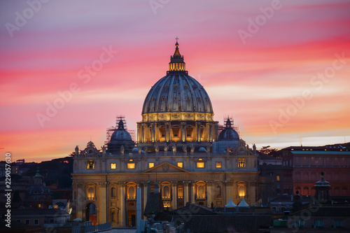 The Papal Basilica of St. Peter in the Vatican at sunset in the evening, Rome