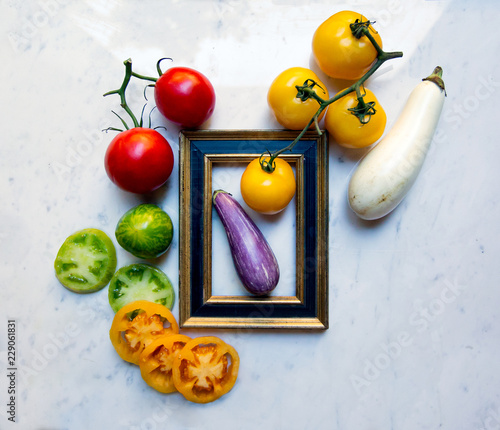 Various organic vegetables with picture frame