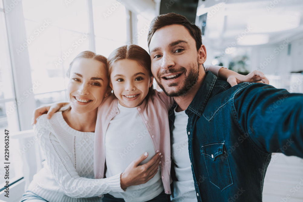 Mom. Dad and Daughter.Happy Together.Young Family. Mom. Dad and Daughter.Happy Together.Young Family.