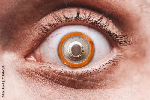 Eye with alkalin battery, instead of pupil, the concept of human use of various stimulants photo