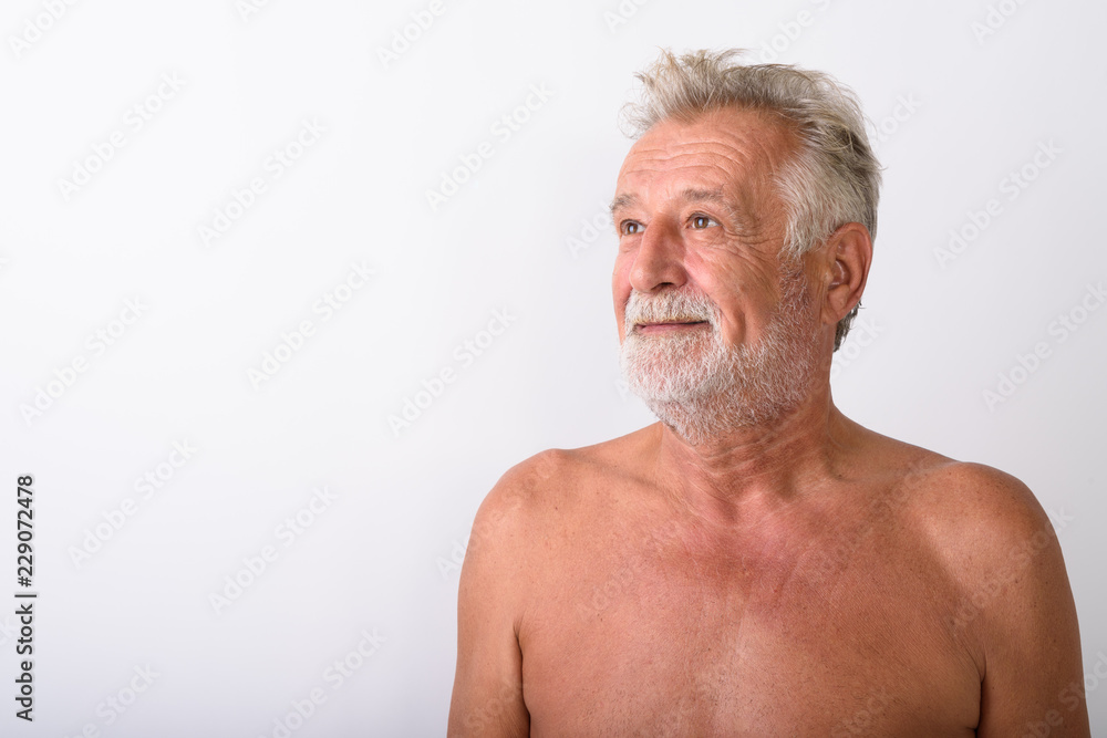 Obraz premium Close up of handsome senior bearded man thinking shirtless