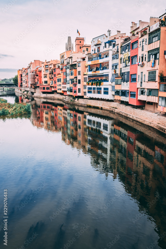 Obraz premium Reflections of House Facades in Spain