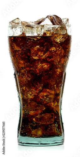 Cola with ice in glass cup isolated on white background