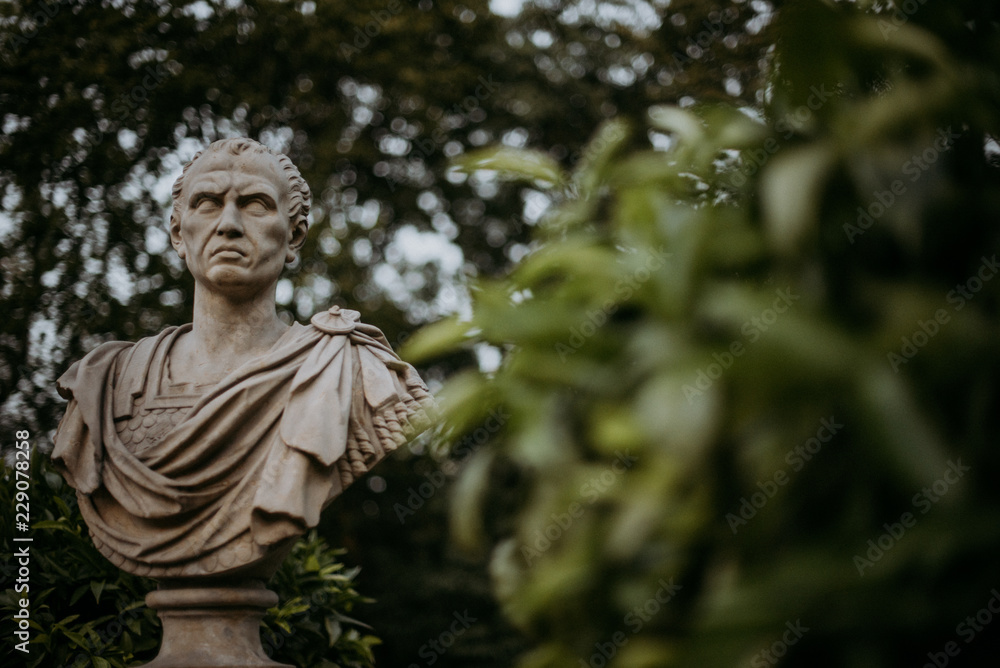 Statue of man in garden Statue of man in garden