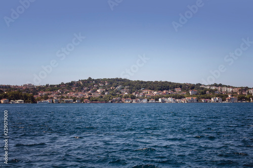View of Bosphorus and european side in a sunny summer day in Istanbul. Image is captured neighborhood called Kanlica / Beykoz in Asian side. © theendup