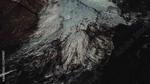 Iceland landscape of glacier Solheimajokull glacier. Beautiful nature aerial drone video of Icelandic nature. Tourist destination and attraction on South Iceland. Glacial lake / lagoon.