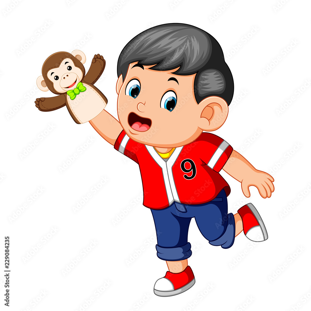 the boy was using monkey puppet the boy was using monkey puppet