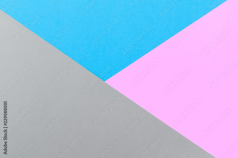 Bright, geometric gray-pink-blue paper background with place for text. Abstract geometric festive background, flat lay Bright, geometric gray-pink-blue paper background with place for text. Abstract geometric festive background, flat lay