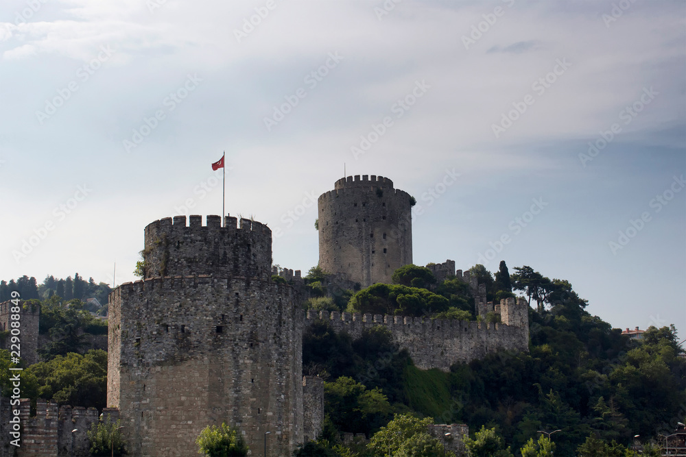 Close up view of Rumelihisari or Boğazkesen Castle (medieval fortress) in Istanbul. It is a sunny summer day. Close up view of Rumelihisari or Boğazkesen Castle (medieval fortress) in Istanbul. It is a sunny summer day.