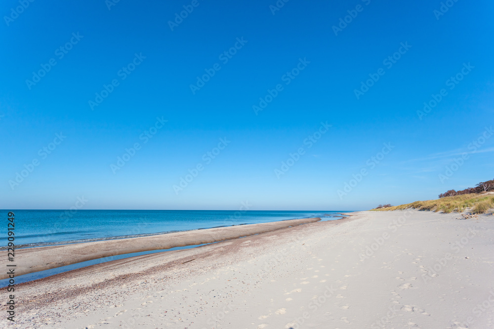 bright wild beach of white sand by the blue sea, Curonian Spit National Park