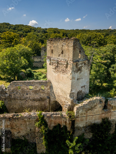 Aerial view of Saschiz Szaszkezd castle and medieval Saxon village in Transylvania Romania photo