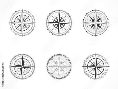 Vector set of vintage compasses or marine wind roses. Collection in line art style. Black line. Isolated on white background.