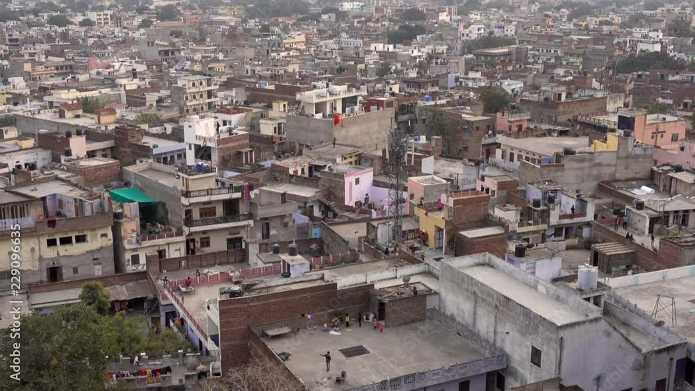 Aerial view of Jaipur city with some children playing with kites. Rajasthan state, India. Aerial view of Jaipur city with some children playing with kites. Rajasthan state, India.