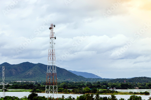 Radio and TV broadcast antenna Set amidst forests and mountains in Kanchanaburi, Thailand.