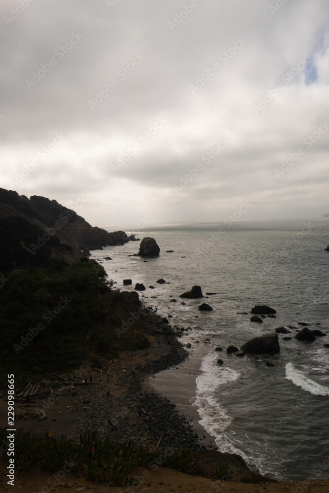 California coastal cliffs with ocean waves and horizon
