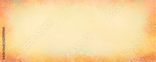 orange and yellow background in autumn or fall design for thanksgiving or halloween with vintage border texture of old distressed paint grunge