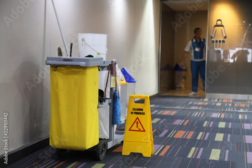 Closeup of cleaning equipment and tools for floor cleaning.