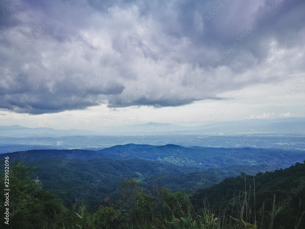 View of Mountains covered by heavy fog at Doi Inthanon National Park in Chiang Mai Province, northern Thailand View of Mountains covered by heavy fog at Doi Inthanon National Park in Chiang Mai Province, northern Thailand