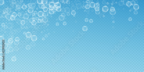 Random soap bubbles abstract background. Blowing b