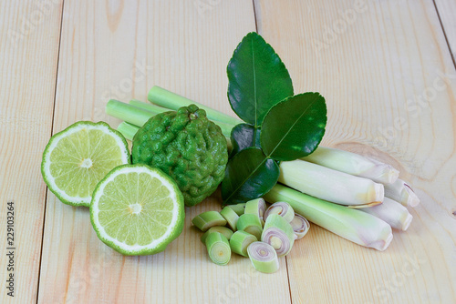 bergamot and lemon grass on the wood background, thai herb for food cooking