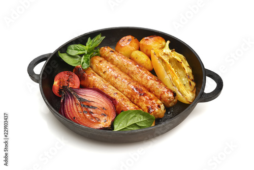 Grilled sausages for grilling in a pan. Isolated on white background.