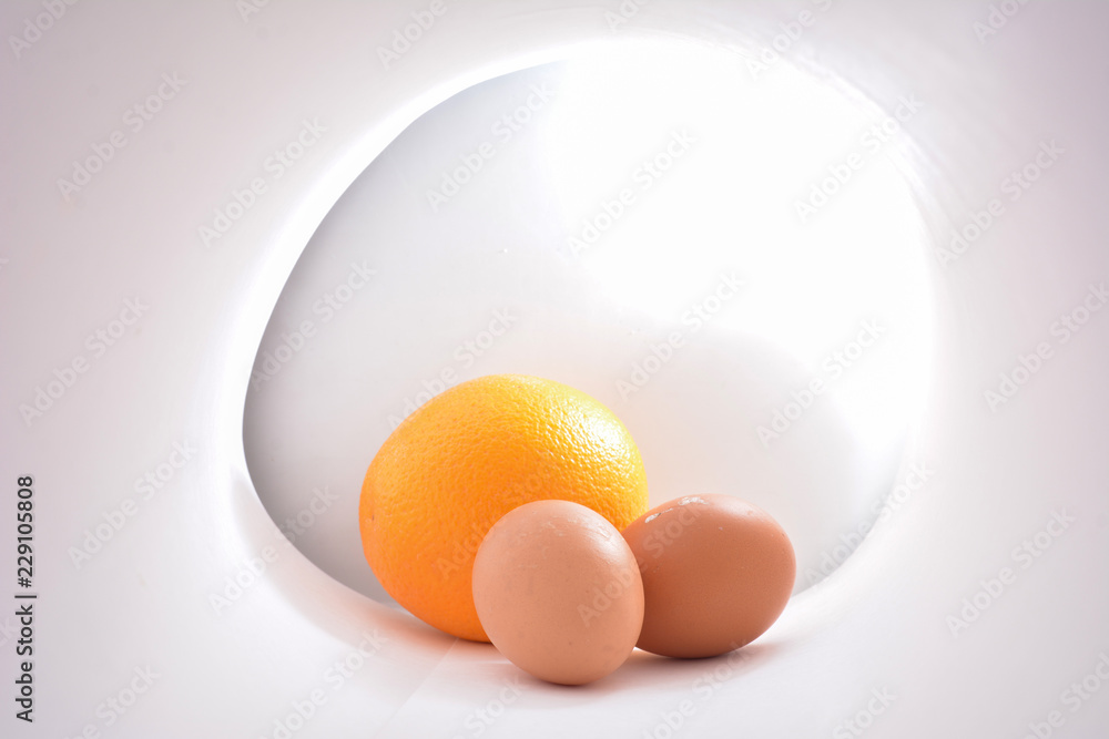egg with orange in tube egg with orange in tube