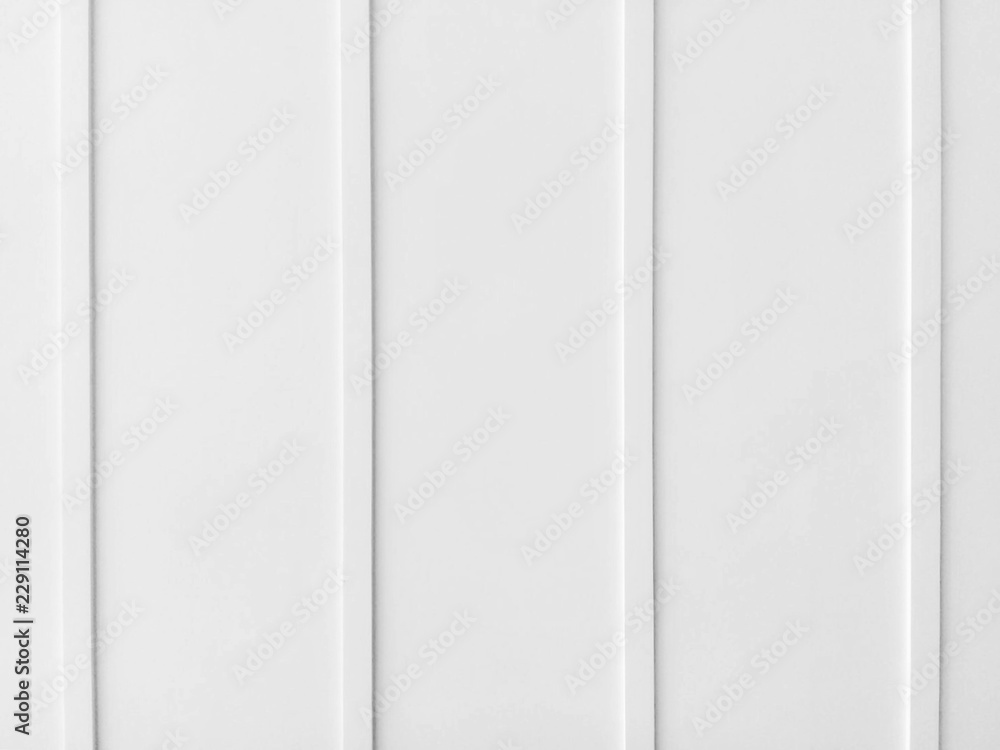 Cement white wall with swell line column texture design. Indoor wall pattern  background Soft focus. Stock Photo