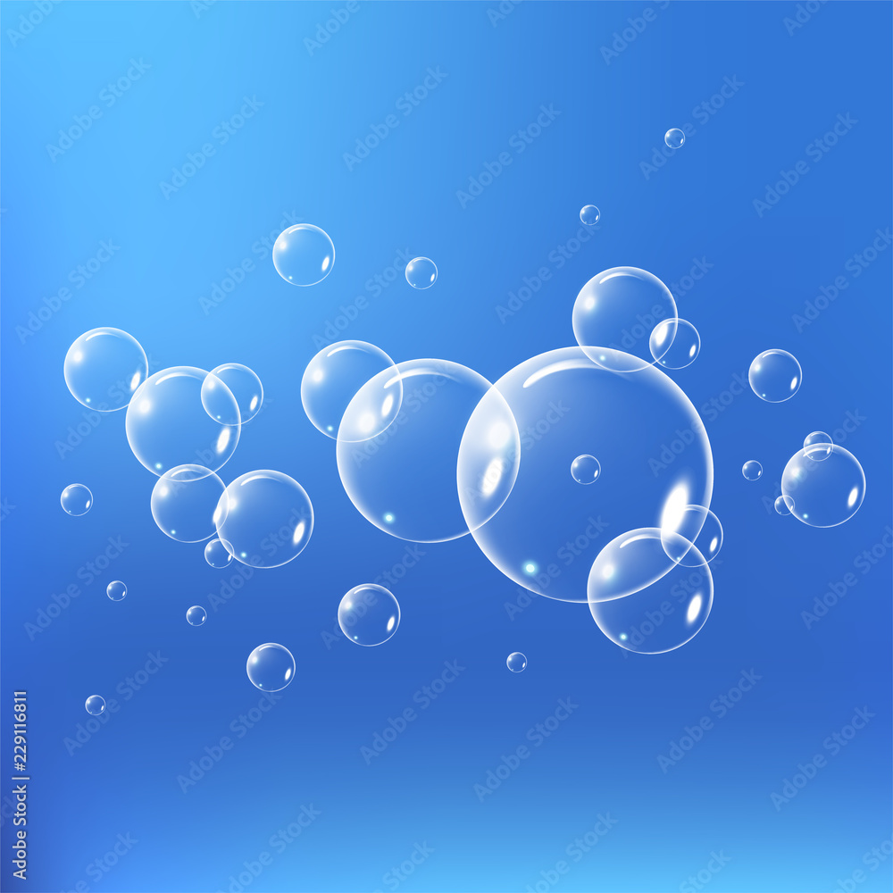Obraz premium Realistic soap bubbles set isolated on the blue background. vector Illustration