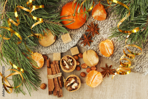 Still life formed with pine branches and New Year sweets