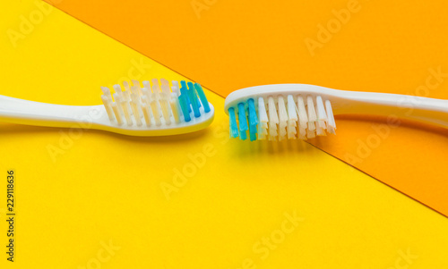 Flat lay composition with manual toothbrushes on color background  close up