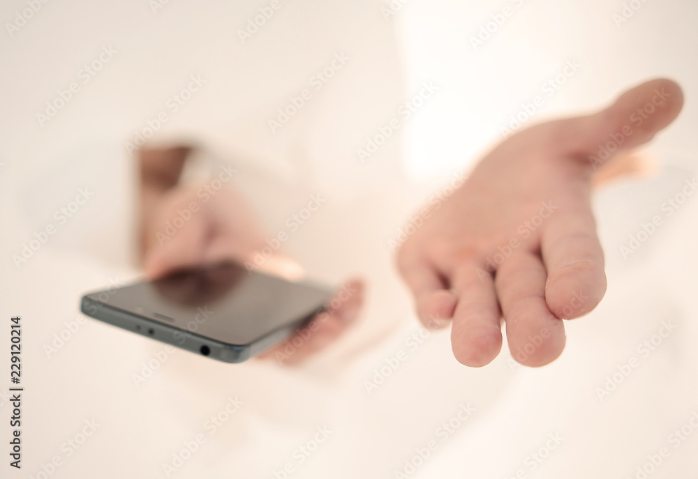 close up. a new smartphone in the hands of a businessman close up. a new smartphone in the hands of a businessman