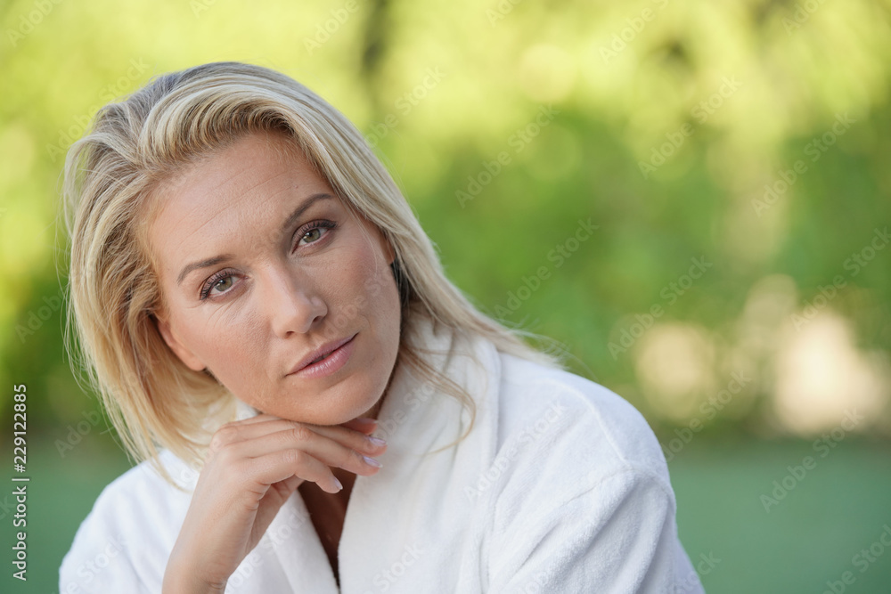Portrait of beautiful blond 40-year-old woman