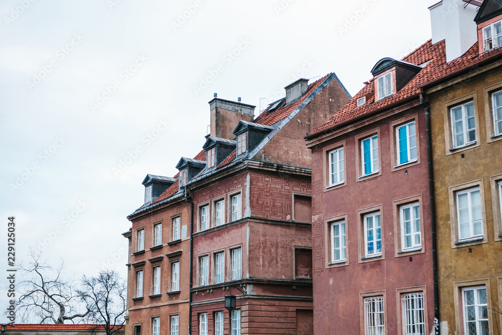 Obraz premium Beautiful street with traditional houses in Warsaw in Poland.