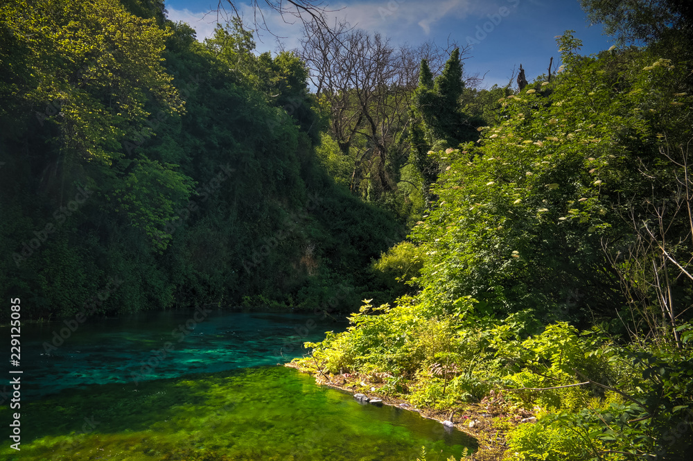 View to Blue Eye spring, initial water source of Bistrice river,near Muzine in Vlore County, southern Albania. View to Blue Eye spring, initial water source of Bistrice river,near Muzine in Vlore County, southern Albania.