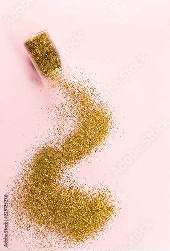 Wallpaper Mural A track of scattered gold spangles on a pink background. Torontodigital.ca