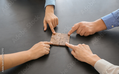 Business team assembling pu...