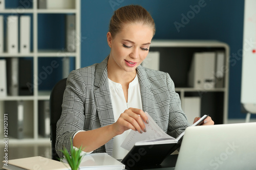 Beautiful female secretary ...