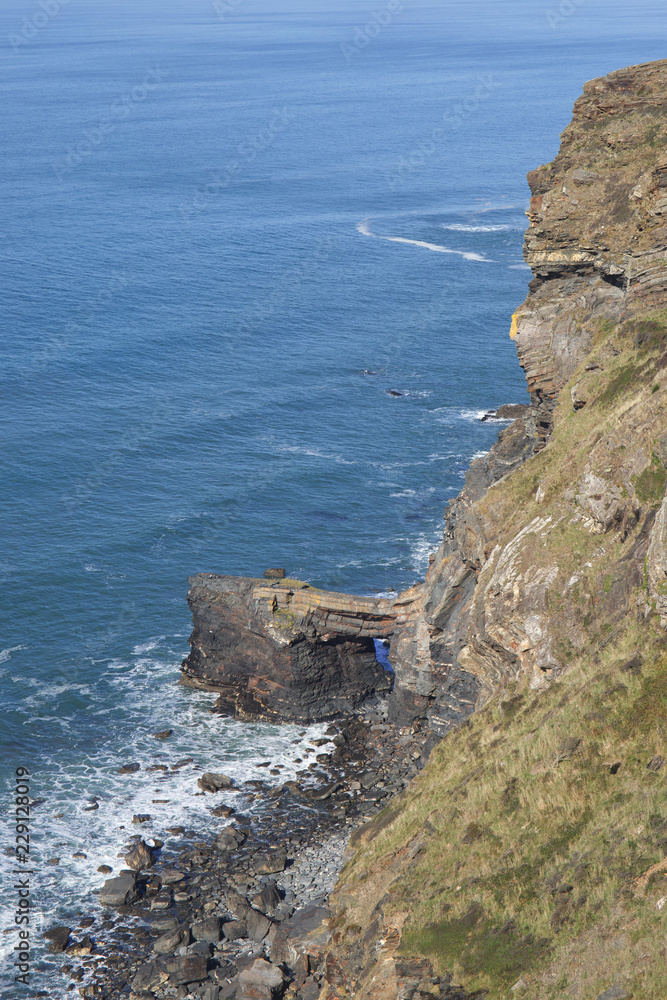 Coastal landscape scenery showing a rock arch on the west Cornwall coast