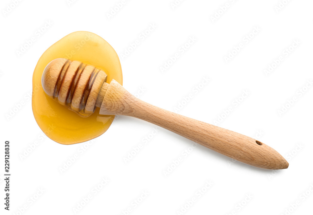 Sweet honey and dipper on white background Sweet honey and dipper on white background