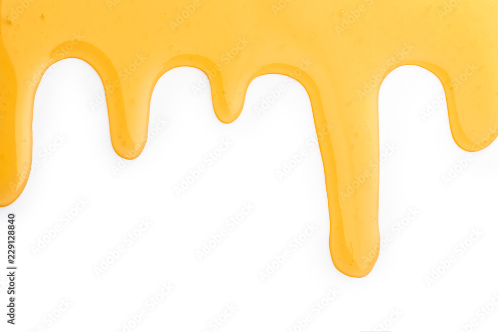 Sweet spilled honey on white background Sweet spilled honey on white background