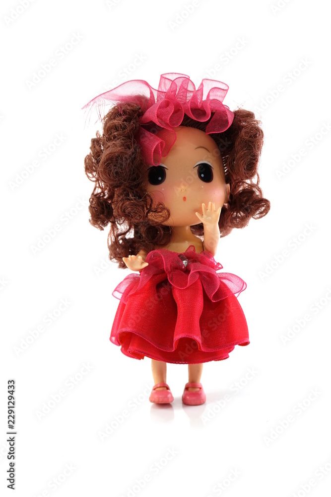 beautiful baby doll with red dress isolated on white background beautiful baby doll with red dress isolated on white background