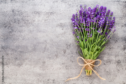 Fototapeta Naklejka Na Ścianę i Meble -  Lavender flowers, bouquet on rustic background, overhead.