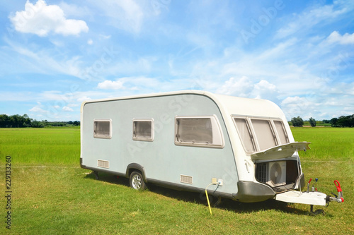 caravan or camper car with blue sky