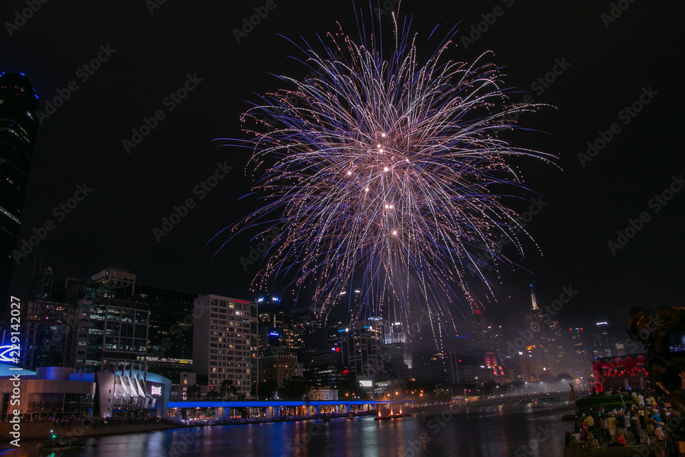 fireworks over river