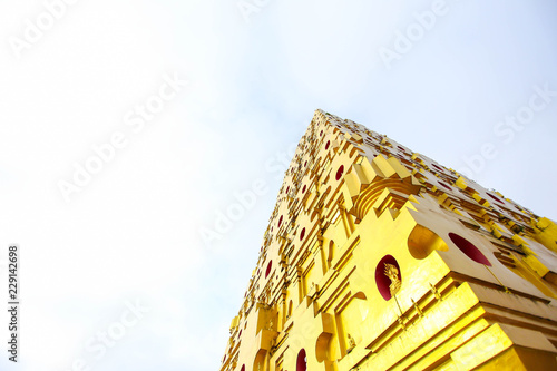 Golden pagoda of Bodhgaya Stupa or Phuthakaya Pagoda, Sangklaburi, Kanchanaburi, Thailand photo