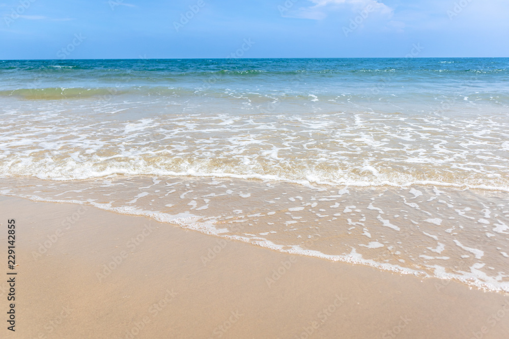 Tropical beach with green ocean and small wave. Tropical beach with green ocean and small wave.