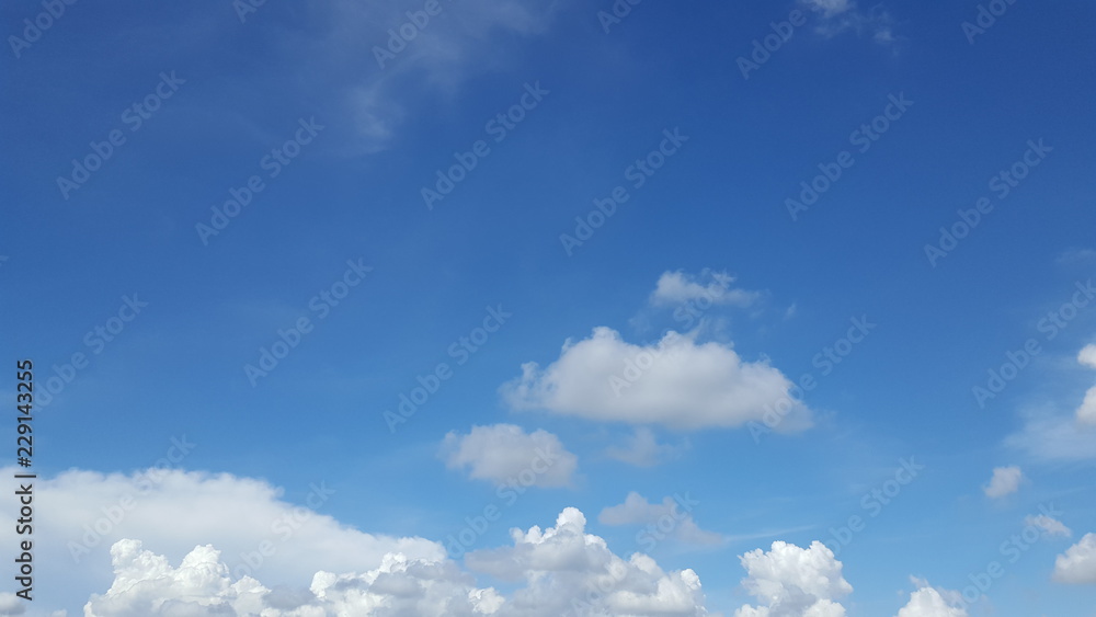 Blue skies with clouds in a clear day, in the morning. Blue skies with clouds in a clear day, in the morning.