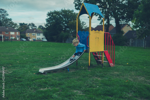 Little boy on slide