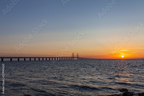   resund bridge at the evening with sunset